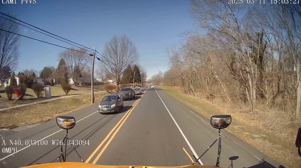 Driver swerves around school bus at stop in Lancaster County, video ...