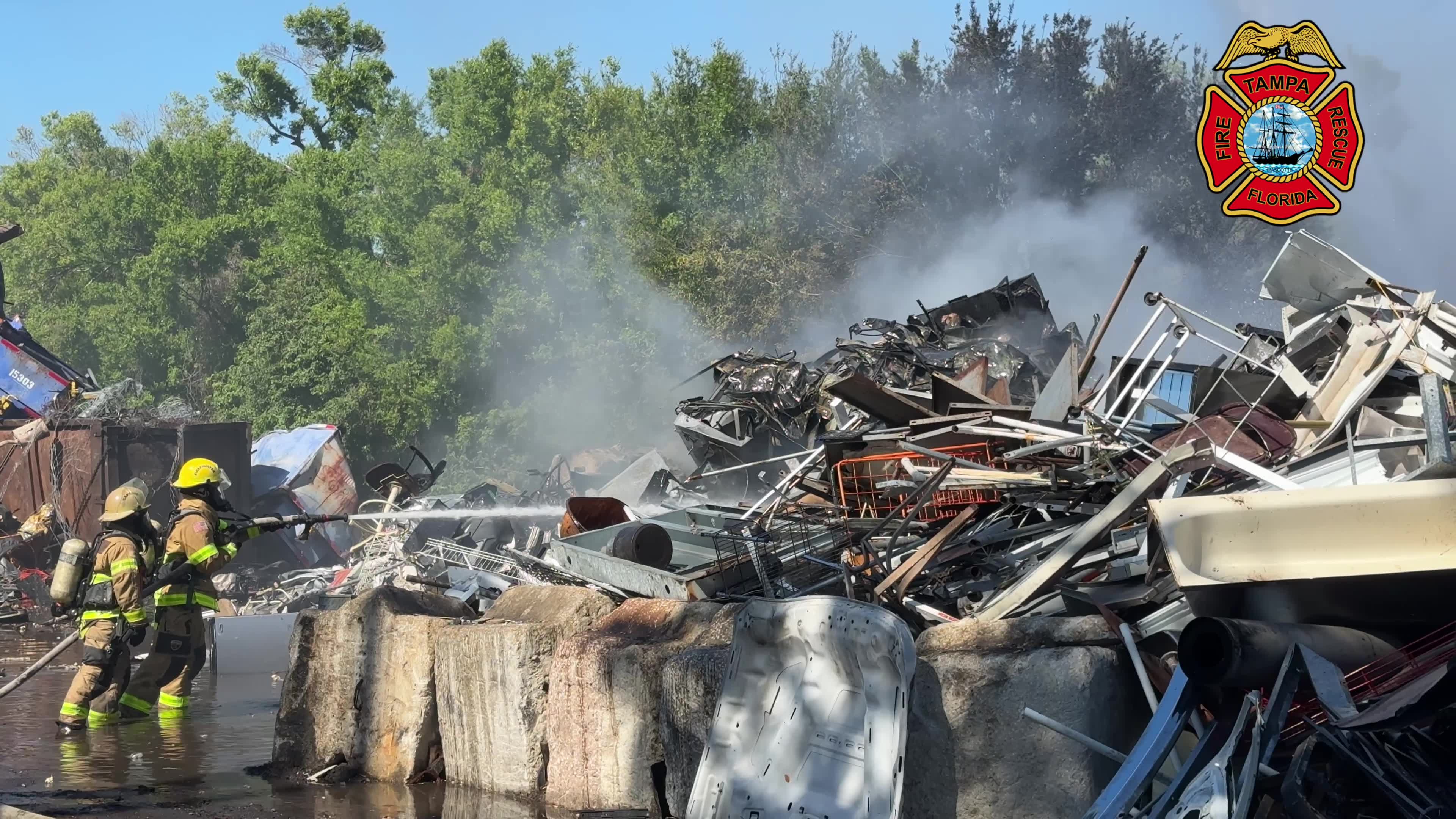 Tampa fire crews battle fire at recycled metals facility – WFLA