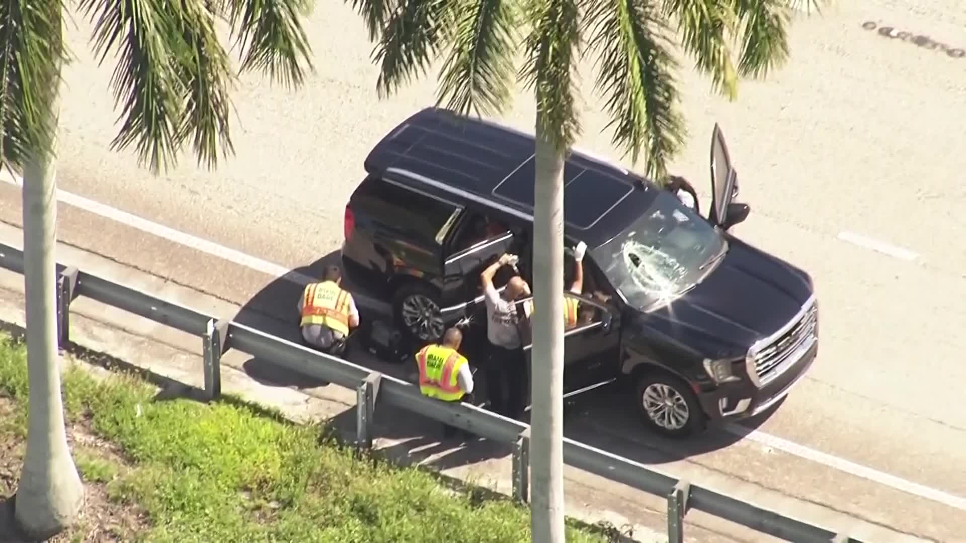 Woman injured after piece of medal falls off truck, goes through ...
